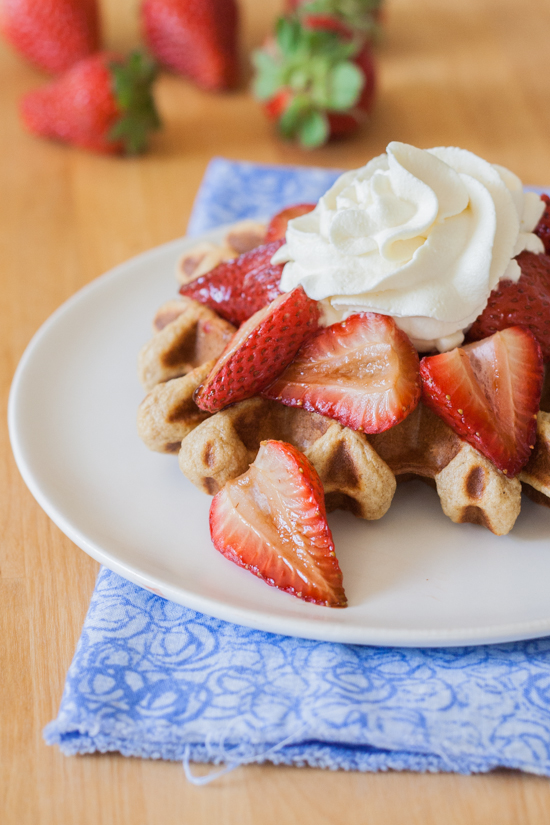 Flavor-packed and delicious, Ginger-Spiced Waffles topped with Balsamic Roasted Strawberries works well as an indulgent breakfast or a simple dessert.
