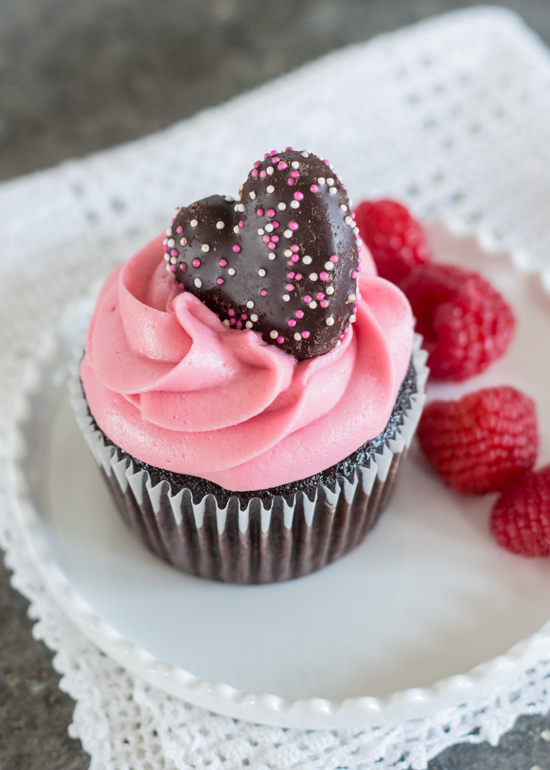 Fresh raspberries, Framboise, and plenty of dark chocolate come together in these decadent Raspberry Chocolate Cupcakes. A perfect recipe for Valentine's Day!
