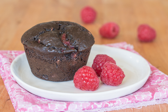 Cocoa powder imparts bittersweet chocolate flavor and juicy raspberries add tart sweetness to these Chocolate Raspberry Muffins. This quick, easy snack recipe is a serious crowd pleaser.