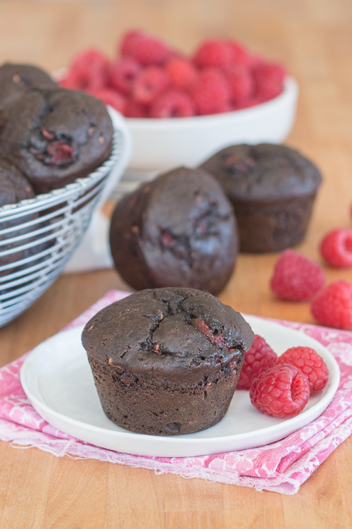 Cocoa powder imparts bittersweet chocolate flavor and juicy raspberries add tart sweetness to these Chocolate Raspberry Muffins. This quick, easy snack recipe is a serious crowd pleaser.