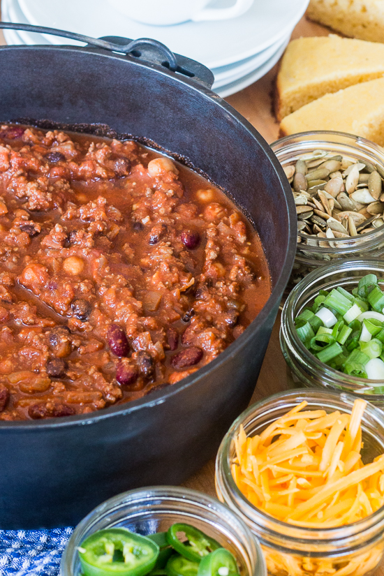 Bacon adds richness and smoked paprika imparts a deep, complex flavor to this easy Beef and Bean Chili. Serve it on its own or with rice, baked potatoes, or mac and cheese! This recipe produces a generous pot of chili, which makes it great for parties and leftovers.