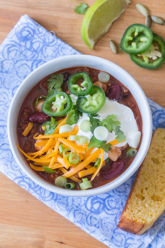 Bacon adds richness and smoked paprika imparts a deep, complex flavor to this easy Beef and Bean Chili. Serve it on its own or with rice, baked potatoes, or mac and cheese! This recipe produces a generous pot of chili, which makes it great for parties and leftovers.
