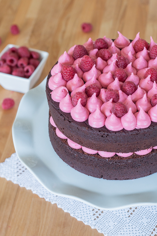 Simple and elegant, this raspberry chocolate layer cake blends rich, decadent chocolate with tart, sweet raspberries. Raspberry liqueur adds a fruity backdrop to the chocolate cake layers, while raspberry jam and raspberry buttercream add bright sweetness. 