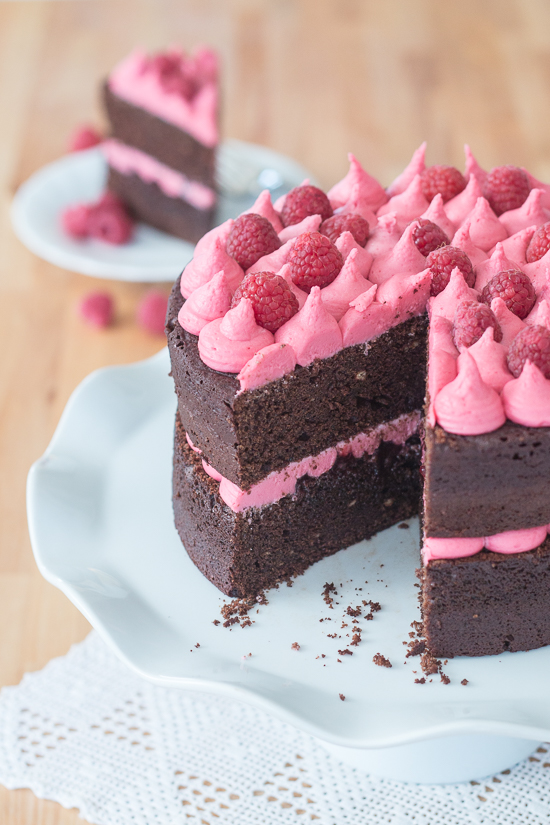 Simple and elegant, this raspberry chocolate layer cake blends rich, decadent chocolate with tart, sweet raspberries. Raspberry liqueur adds a fruity backdrop to the chocolate cake layers, while raspberry jam and raspberry buttercream add bright sweetness. 