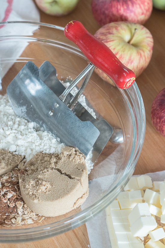 Packed with diced apple, sweetened with maple syrup, and spiced with cinnamon, these maple-oat apple muffins get extra sweetness and texture from a lightly spiced streusel topping. Oven warm and slathered with maple-cinnamon mascarpone, they're a perfect fall treat.