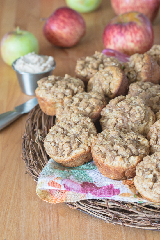 Packed with diced apple, sweetened with maple syrup, and spiced with cinnamon, these maple-oat apple muffins get extra sweetness and texture from a lightly spiced streusel topping. Oven warm and slathered with maple-cinnamon mascarpone, they're a perfect fall treat.