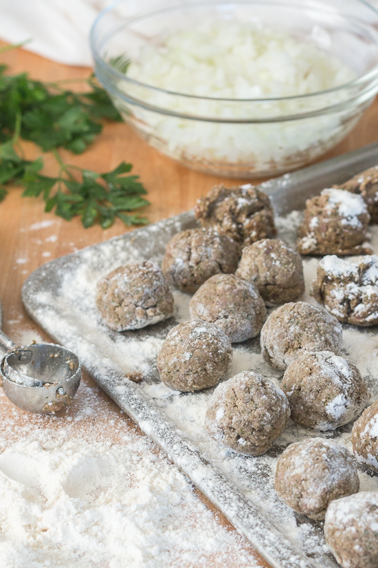 Ladled over spaghetti, these classic meatballs with simple tomato sauce epitomize hearty comfort food. Serve a crowd with this generous recipe or hoard the leftovers for easy meal planning.