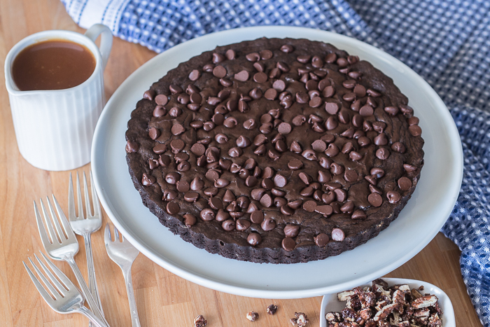 Give decadent chocolate brownies an elegant flair by swapping out a traditional square pan for a fluted tart pan. Top wedges of brownie tart with vanilla ice cream, homemade caramel sauce, and cinnamon pecans to create a sophisticated brownie sundae. 