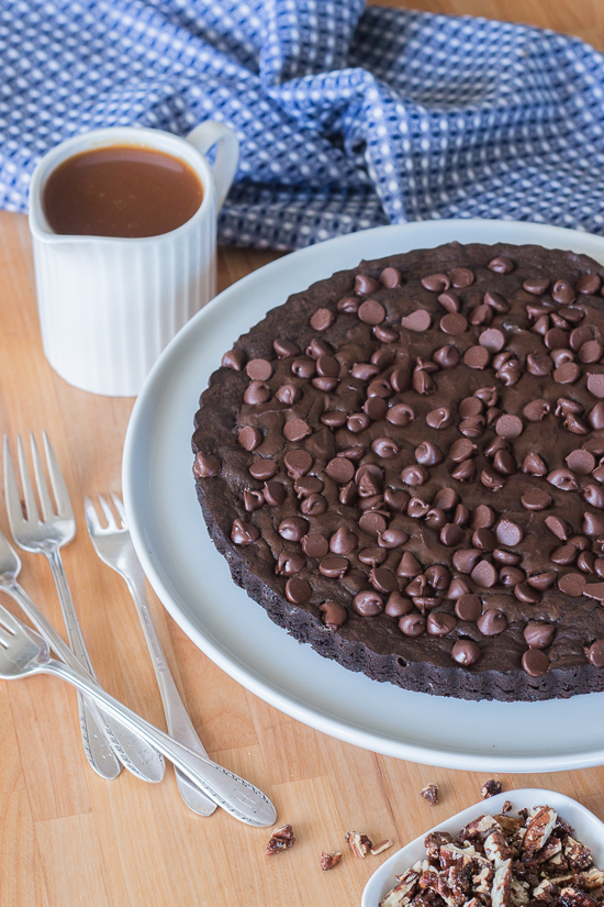 Give decadent chocolate brownies an elegant flair by swapping out a traditional square pan for a fluted tart pan. Top wedges of brownie tart with vanilla ice cream, homemade caramel sauce, and cinnamon pecans to create a sophisticated brownie sundae. 