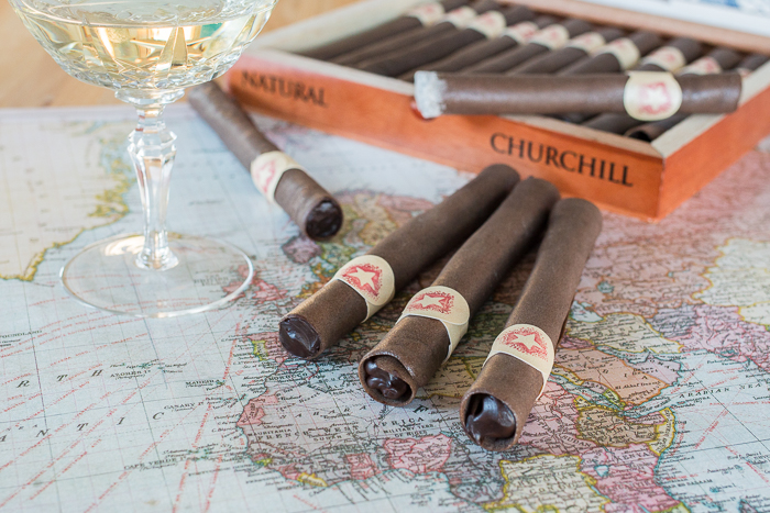 These Chocolate Tuile Cigars with Whisky Ganache feature wafer-thin chocolate cookies loaded with boozy chocolate. This truly decadent treat provides a sweet alternative to the idea of celebratory cigars!