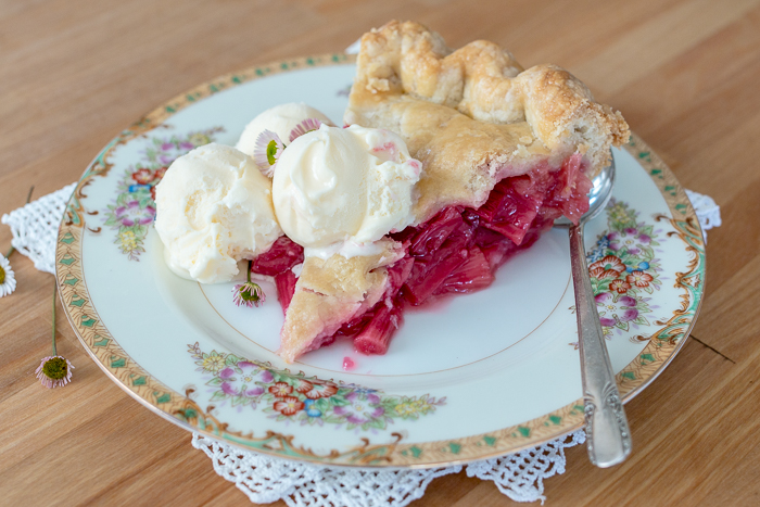 Sweet and tangy, this straight-up rhubarb pie shines a spotlight on the tantalizing flavor of  rhubarb's bright crimson stalks. A rich buttery pastry crust provides the perfect backdrop for this pleasantly sour filling.