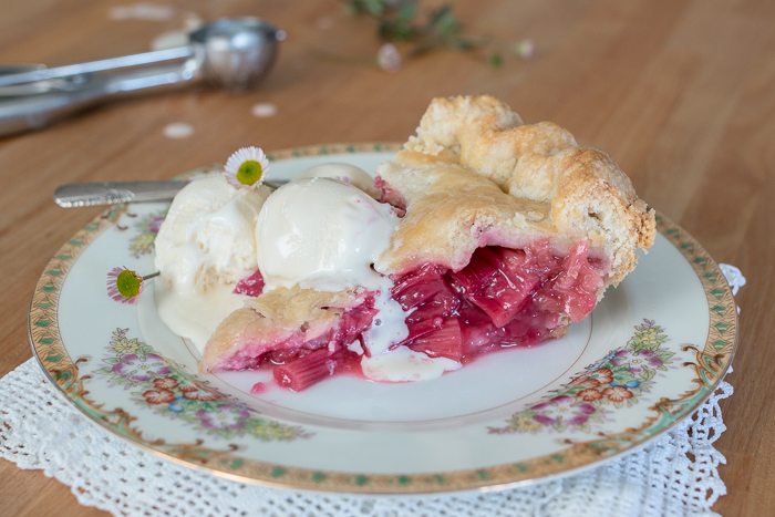 Sweet and tangy, this straight-up rhubarb pie shines a spotlight on the tantalizing flavor of  rhubarb's bright crimson stalks. A rich buttery pastry crust provides the perfect backdrop for this pleasantly sour filling.