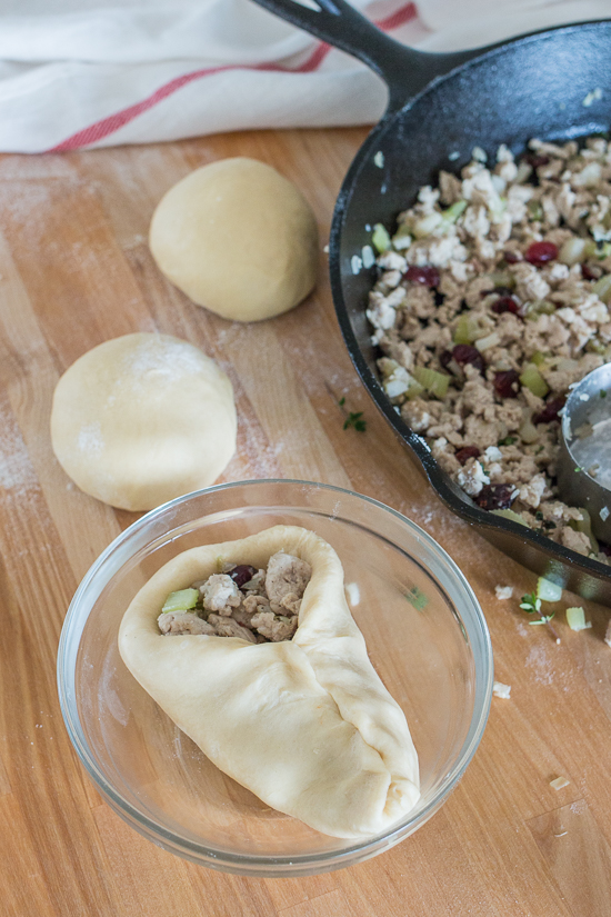 Light, tender dough encases a warm, thyme-laced turkey filling in these Turkey Cranberry Runzas. These deliciously satisfying stuffed rolls taste like an inside-out turkey dinner. 