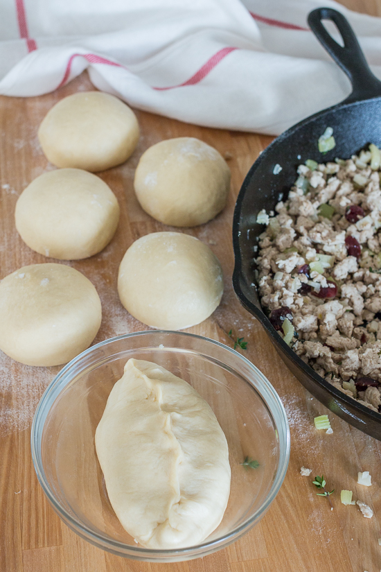 Light, tender dough encases a warm, thyme-laced turkey filling in these Turkey Cranberry Runzas. These deliciously satisfying stuffed rolls taste like an inside-out turkey dinner. 