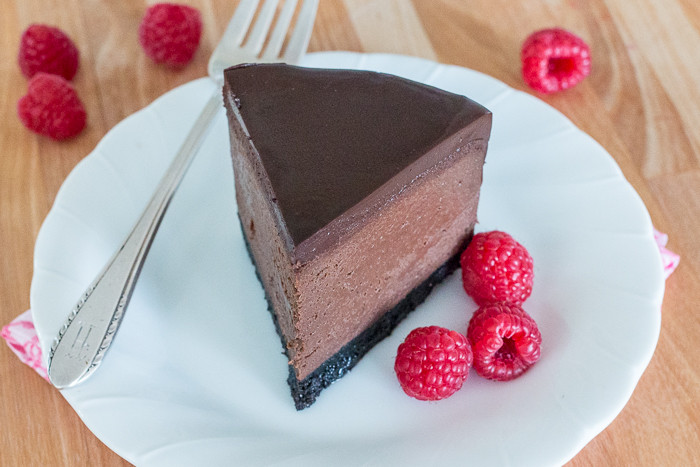 Rich and luscious, this Bittersweet Chocolate Cheesecake delivers big flavor in pint-size packaging. With its crisp chocolate cookie crust, smooth chocolate cheesecake filling, and decadent ganache topping, this dessert will delight both chocolate and cheesecake lovers.  