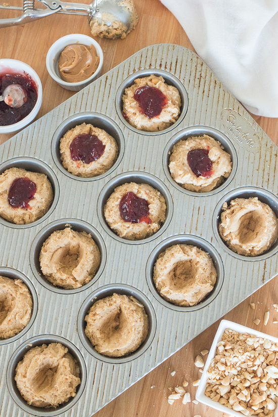 Nutty and fruity with great crunch from a generous quantity of chopped peanuts, these Peanut Butter and Jelly Muffins will surprise and delight family and friends. 