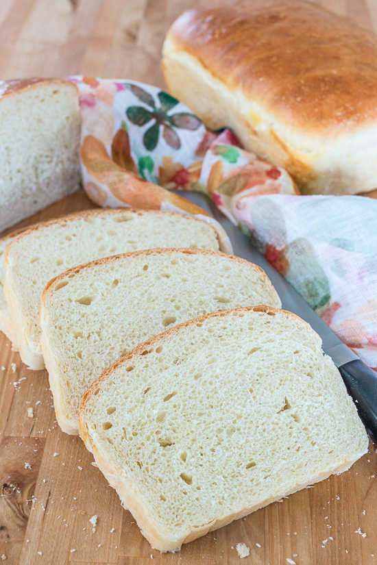 With a glossy golden crust and creamy white interior, this Classic Sandwich Bread is tender and silky yet sturdy enough for piling high with cold cuts, veggies, and spreads or grilling with your favorite cheese.