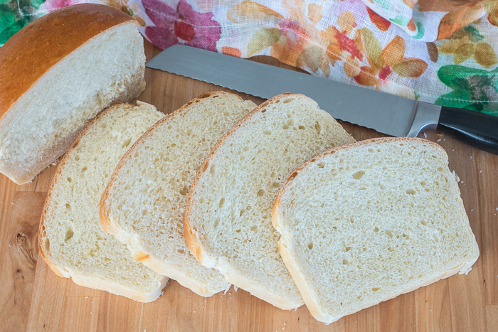 With a glossy golden crust and creamy white interior, this Classic Sandwich Bread is tender and silky yet sturdy enough for piling high with cold cuts, veggies, and spreads or grilling with your favorite cheese.