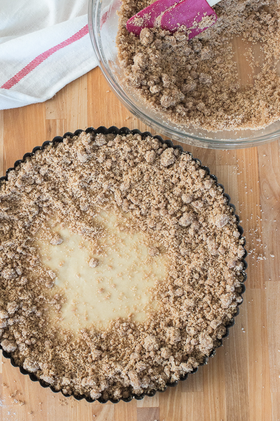 Simple yet indulgent, this New York-Style Crumb Cake features a thick, satisfying layer of cinnamon-brown sugar topping that perfectly complements the light and tender vanilla cake beneath it.