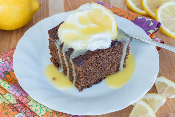 Moist and deeply spiced, this Old Fashioned Gingerbread recipe delivers comfort food at its best. With a dollop of whipped cream and a drizzle hot lemon sauce, the warm spices and earthy molasses richness of this classic American quick bread make it a superb fall treat.