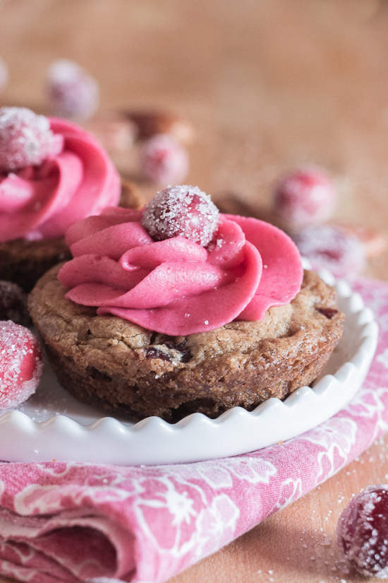 With their deep pink cranberry buttercream and glittery sugared cranberries, these pretty Muffin Tin Cranberry-Pecan Blondies make a great, easy-to-serve dessert for festive occasions.