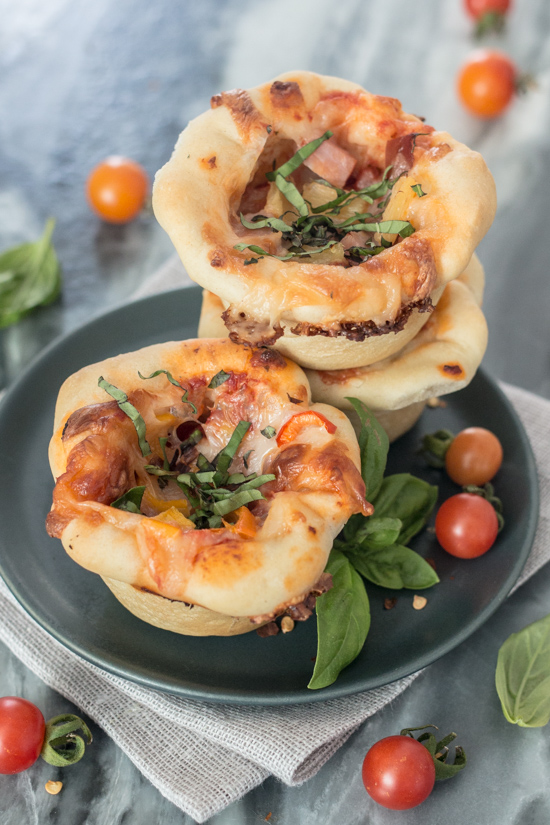 These Mini Deep Dish Pizzas deliver big flavor in adorable muffin-sized packaging. Loaded with mozzarella cheese, flavorful tomato sauce, and tasty fillings, these petite pizzas make a satisfying, easy-to-prepare meal. 