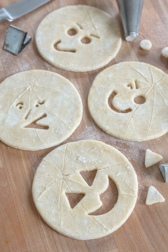 Perfect for Halloween, these adorable Jack-O'-Lantern Pumpkin Hand Pies feature a velvety-smooth pumpkin filling tucked between layers of rich, flaky pastry. 