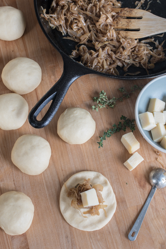 Imagine the amazing combination of flavors in French Onion Soup -- deep, rich, and sweet caramelized onions and nutty, smooth Gruyere cheese -- wrapped up in soft, tender bread, and you'll have these Caramelized Onion and Gruyere-Stuffed Rolls.