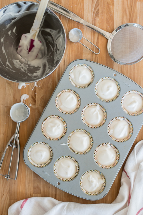 The airy, delicate texture of these Angel Food Cupcakes pairs perfectly with sweet and light Strawberry Whipped Cream. 