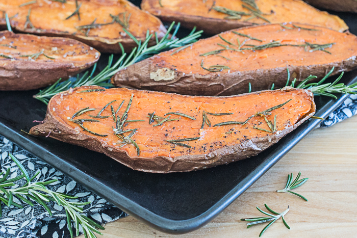 Quick and easy Rosemary Roasted Sweet Potatoes provide a vibrant, flavorful addition to any meal. Their bright orange color looks gorgeous on your plate!