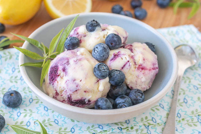 Lemon-Blueberry Swirl Ice Cream combines tart, tangy citrus and bright, sweet berry in a cool, luscious dessert that's perfect for summertime!