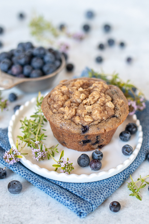 Sweet, tart blueberries add fruity flavor to these warm and satisfying Spiced Blueberry Muffins. A ginger-streusel topping adds texture and pizzazz! 