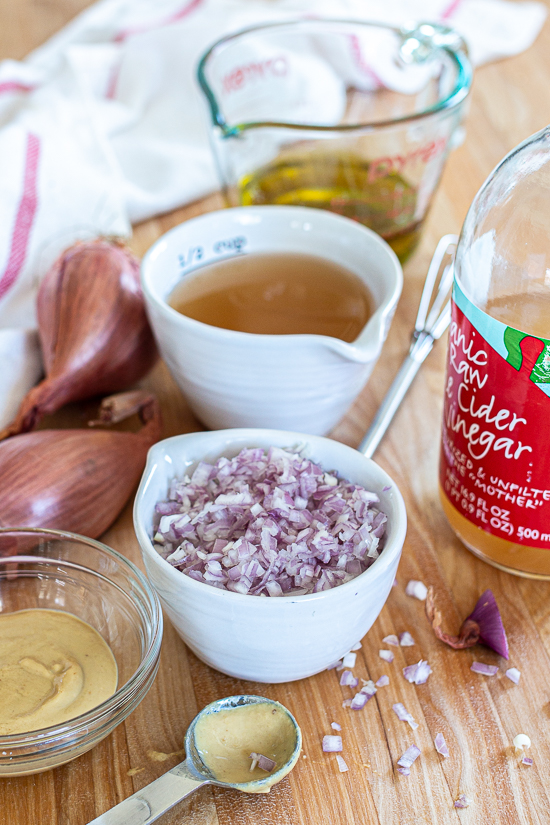 With a tangy kick from apple cider vinegar, this Shallot-Dijon Vinaigrette adds incredible flavor to simple salads and beyond.