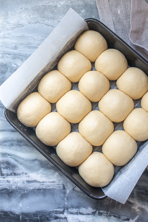 Rich, buttery, and pillowy-soft, these Apple Cider Pull-Apart Rolls make a satisfying addition to any dinner spread. They're perfect for sliders, too!