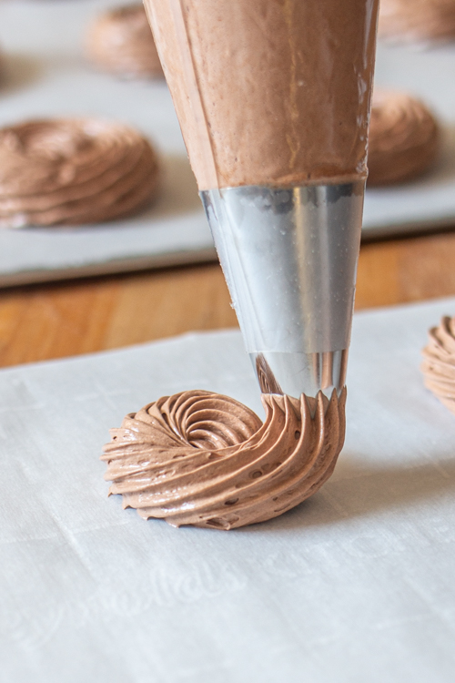 With crisp, crunchy exteriors and gooey, soft centers, these Chocolate Meringue Cookies deliver rich chocolate flavor with an impossibly light and airy texture.