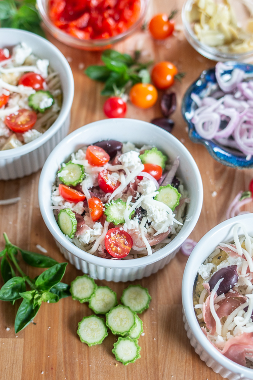 Comforting and delicious, these Easy Baked Polenta Cups feature a thick layer of polenta mounded with rich cheese, chopped vegetables and diced meats. With endless topping choices, this customizable recipe makes a perfect dinner bar meal. 