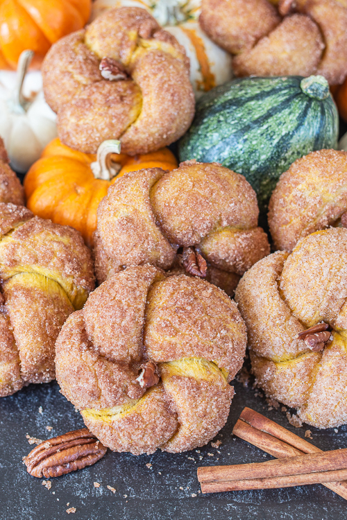 With pumpkin dough and a crisp, cinnamon-sugar coating, these squash-shaped Pumpkin Cinnamon Buns add sweetness and fun to fall festivities!