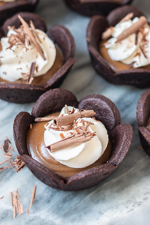 These easy-to-serve Mini Butterscotch Cream Pies feature chocolate cookie cups loaded with rich, creamy butterscotch pudding. 