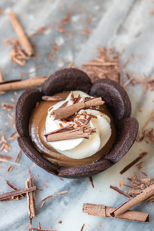 These easy-to-serve Mini Butterscotch Cream Pies feature chocolate cookie cups loaded with rich, creamy butterscotch pudding. 