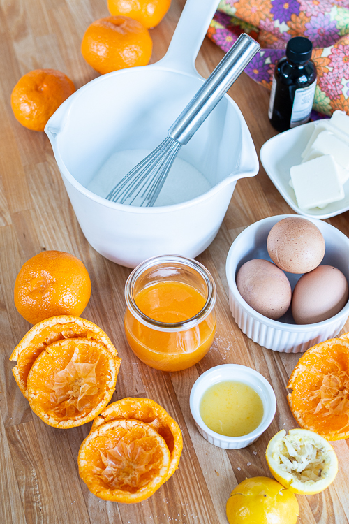 Mini Mandarin Tarts feature sweet, creamy mandarin curd layered into crisp gingerbread cookie cups.  The tangy citrus pairs so well with the gingerbread, delivering a bright, sunny flavor with a holiday twist.