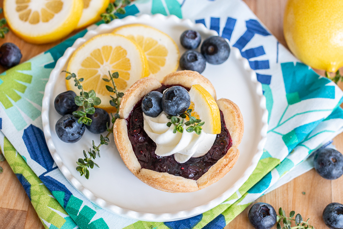 Sweet and tart, these Mini Blueberry Pies deliver bold blueberry flavor with a hint of lemon. Their small size makes them so easy to serve and eat!