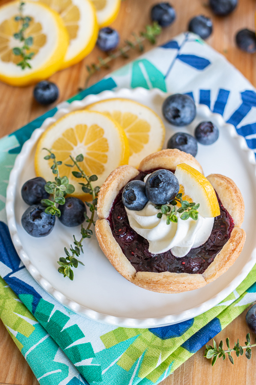 Sweet and tart, these Mini Blueberry Pies deliver bold blueberry flavor with a hint of lemon. Their small size makes them so easy to serve and eat!