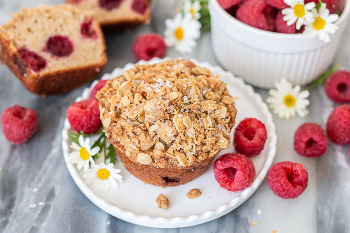 Spiced with cinnamon and cardamom, these quick and easy Raspberry Muffins bake into light and tender treats with a satisfying, crunchy streusel topping. 