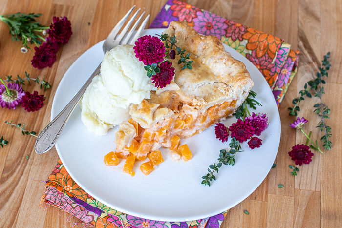 With a flavorful vegetable filling wrapped up in Gruyere pastry dough, this Butternut Squash Pot Pie serves up satisfying wedges of savory goodness. 